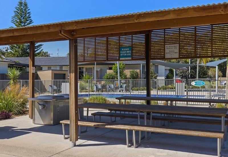 Seaside Holiday Resort Fingal Bay sheltered BBQ area and seating
